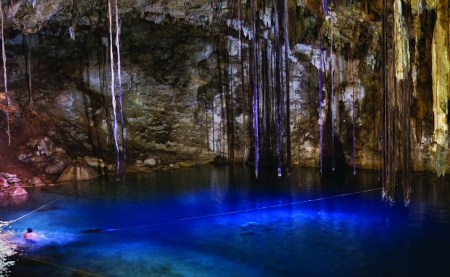 Swimming-snorkeling-and-diving-in-the-blue-of-the-cenote-in-the-Yucatan-peninsula-Mexico