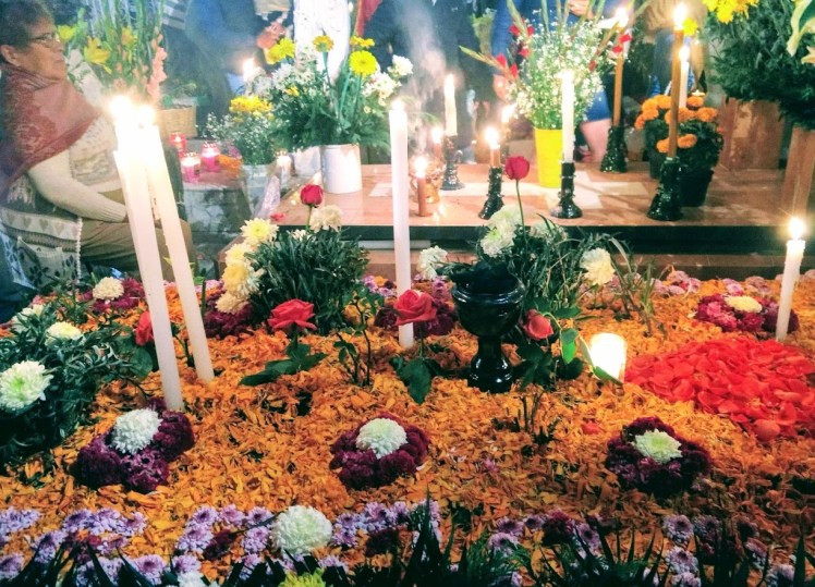 Candle lit graves during the Alumbrada in Mixquic cemetery are beautiful